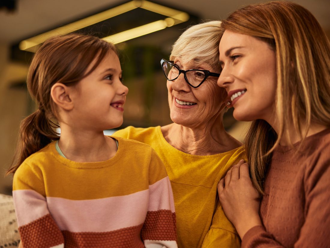 Three generations of a New Zealand family together, reflecting multi-generational insurance planning